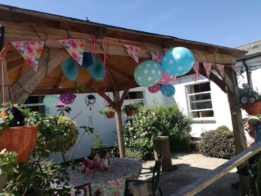 Outdoor decorated space with balloons for a celebration