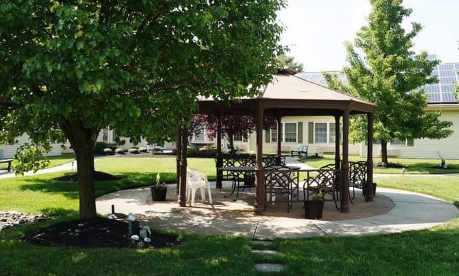 A gazebo in a well-maintained garden area