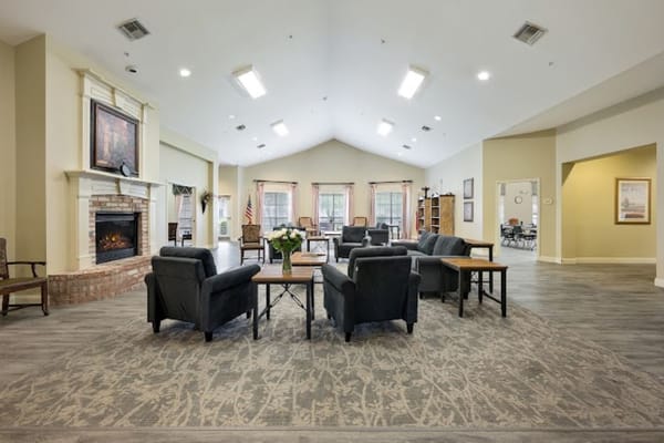 Cozy common area with seating and a fireplace