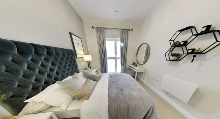 Cozy bedroom with a tufted headboard and modern decor