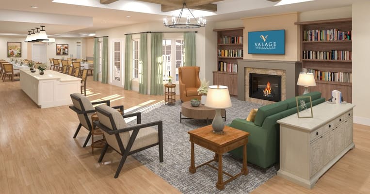 Bright common area with seating and bookshelves