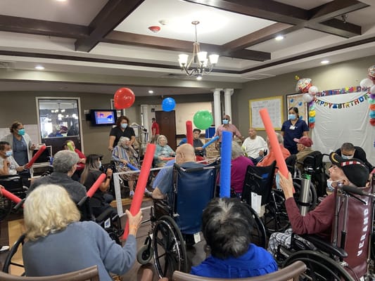 Residents celebrating a birthday party with decorations