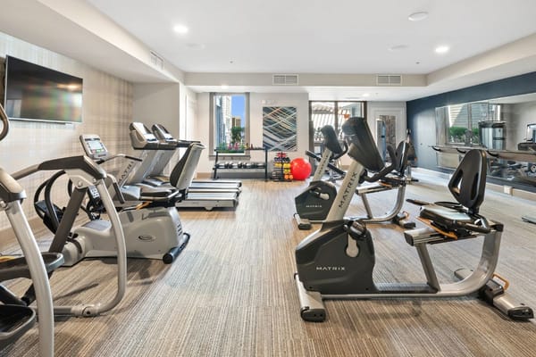 Interior view of a modern gym with exercise equipment