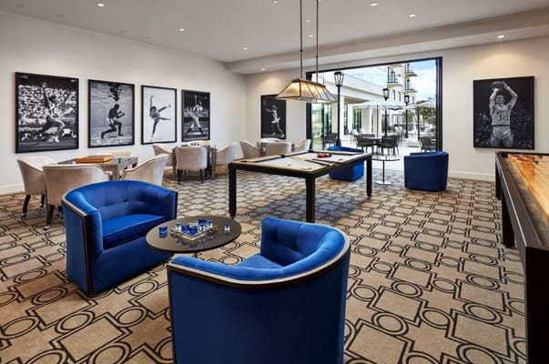 Common area with seating and artwork on the walls