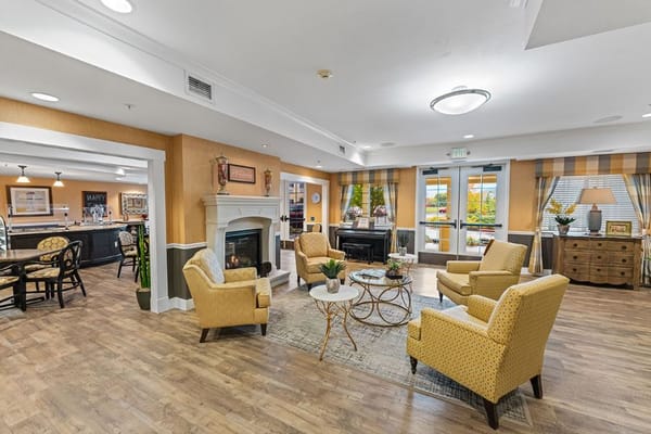 Common area with seating and a fireplace