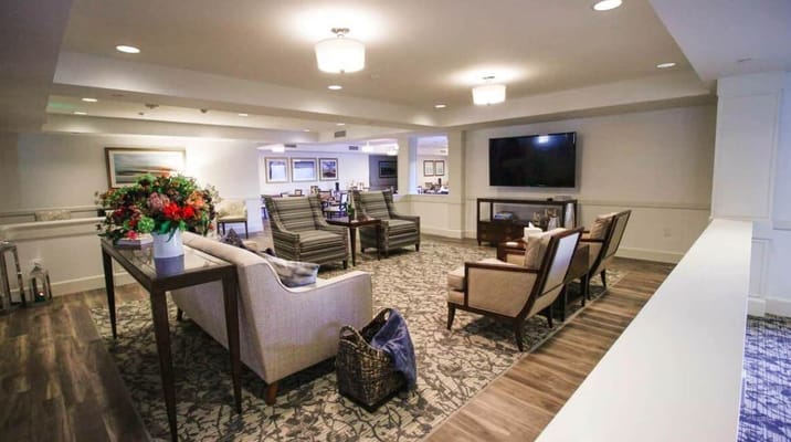 Cozy lounge area with seating and a television