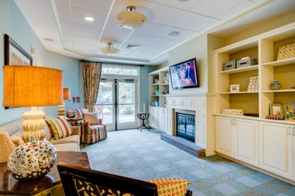 Cozy common area with comfortable seating and a TV