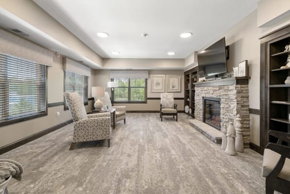 Cozy common area with seating and fireplace