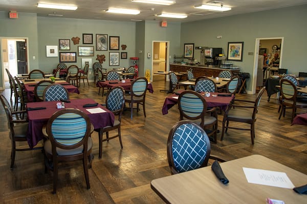 Dining area with tables set up for meals