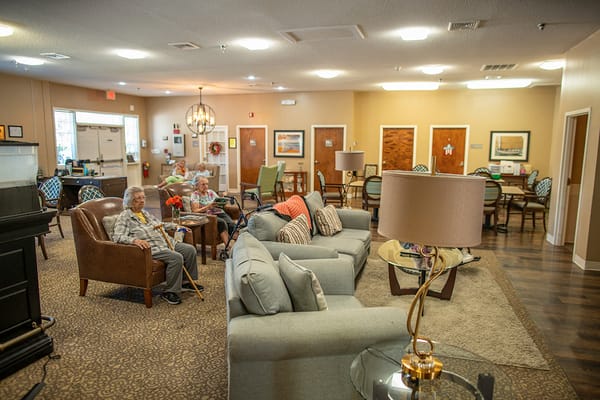 Residents socializing in a cozy common area