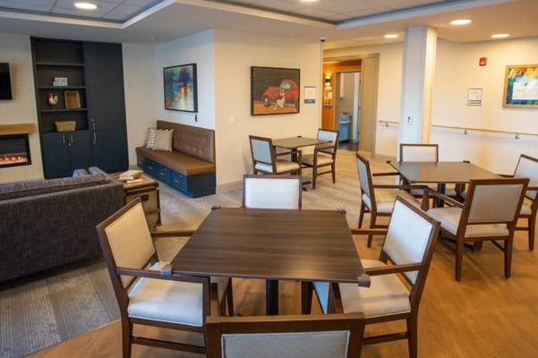 Interior view of a common area with seating and tables