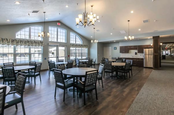 Spacious dining area with tables and chairs