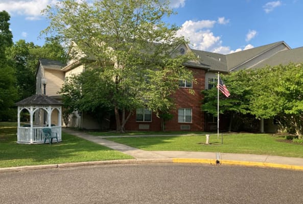 Exterior view of Woodview Estates with landscaping
