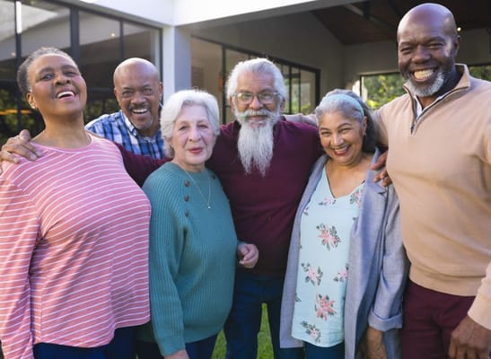 Residents and staff enjoying a joyful group moment