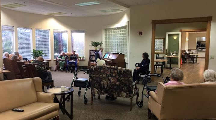 Residents enjoying music in a common area