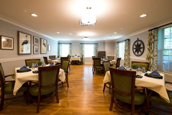 Dining room with tables set for meals