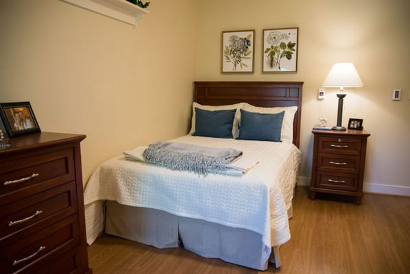 Cozy private resident room with bed and decorations