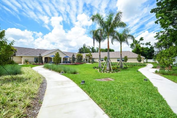 Lush outdoor area with trees and walking paths