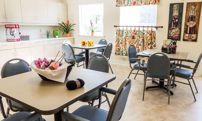 Bright common area with tables and decor