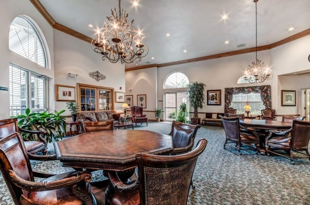 Comfortable lounge area with chandeliers and seating