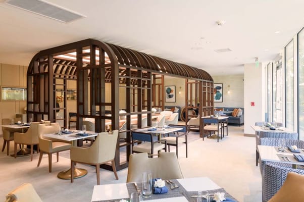 Contemporary dining room with elegant seating and decor