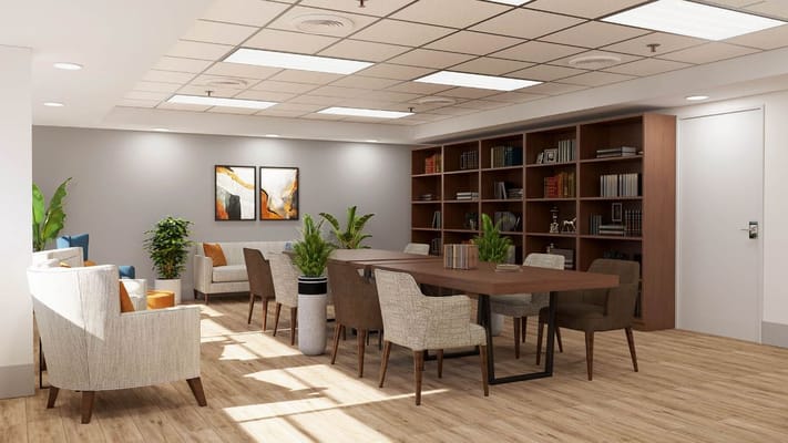 Bright interior common area with tables and seating