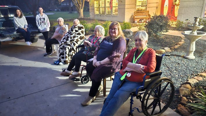 Residents and staff enjoying time outside