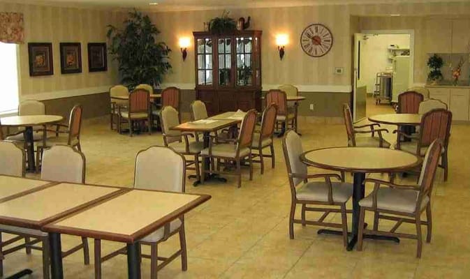 Interior dining area with empty tables and chairs