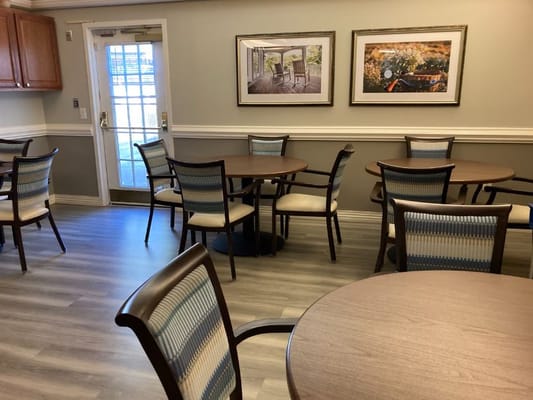 Cozy dining area with round tables and comfortable chairs