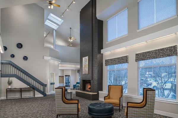 Modern lobby with seating and fireplace