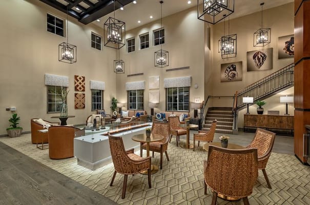 Bright common area with seating and decorative art