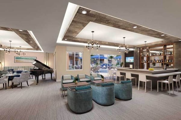 Elegant lounge area with seating and bar