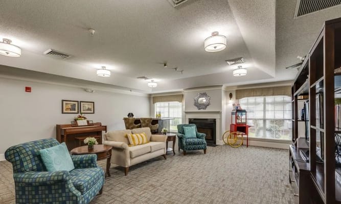 Comfortable living room with seating and piano