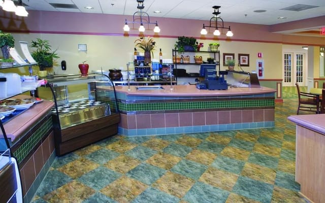 Interior view of the cafe with service counter and seating area