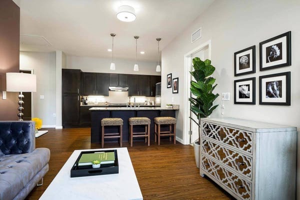 Interior view of a modern common area with kitchen