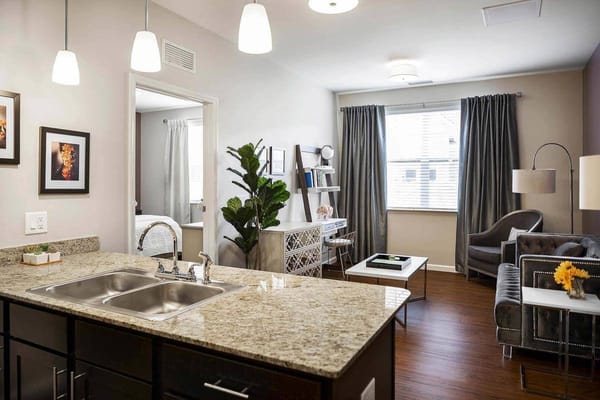 Bright and modern resident room with furnishings