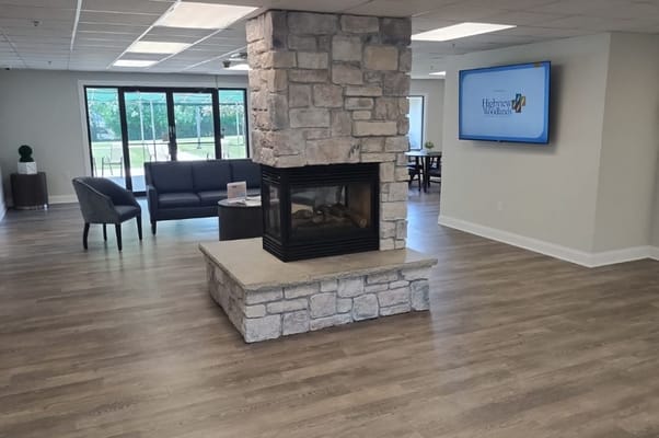 Welcoming common area with a fireplace and seating
