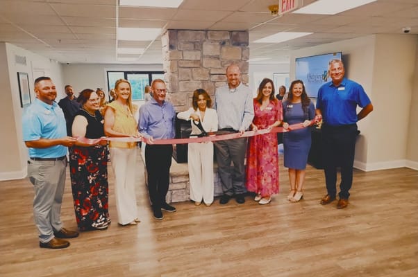 Ribbon cutting ceremony inside the facility