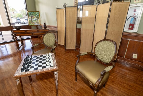 Interior common area with chess set and seating