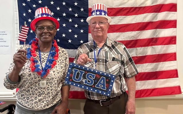 Residents celebrating with patriotic decor indoors