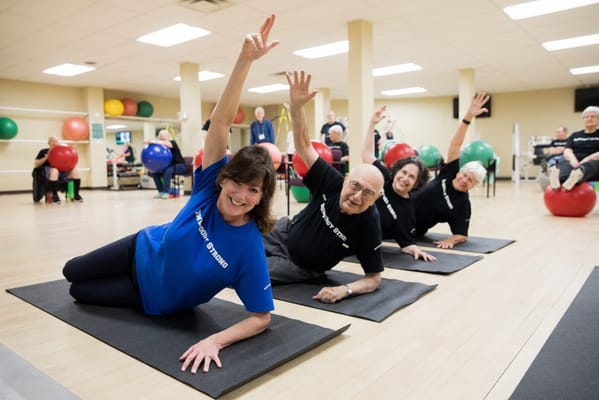 Residents participating in a group exercise class