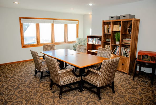 Common area with a large table and seating