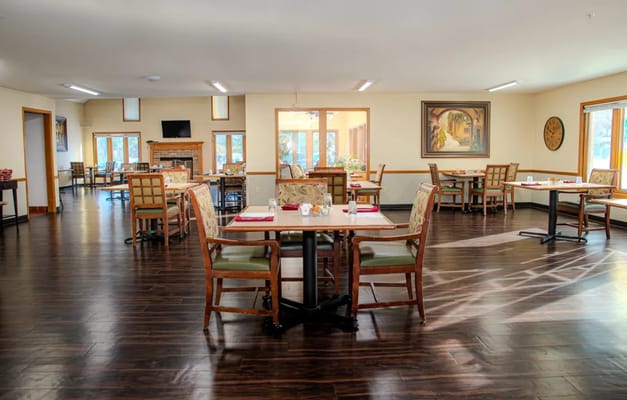 Interior dining area with tables and chairs