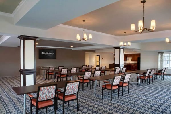 Bright common area with tables and chairs