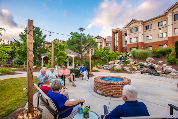 Residents enjoying time outdoors in a garden area
