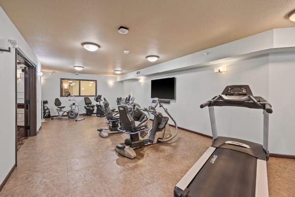 Fitness area with exercise equipment and machines