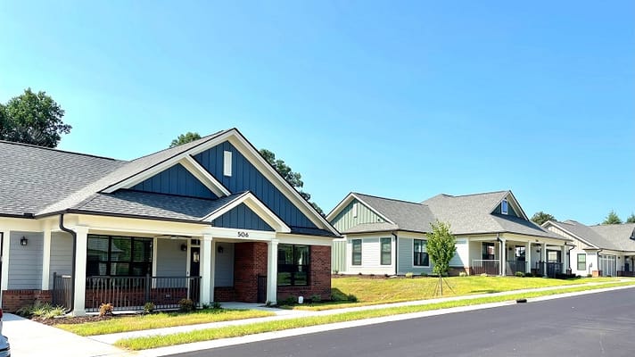 Exterior view of several single-story residential buildings