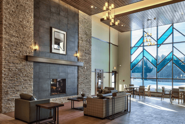 Brightly lit common area with modern furnishings