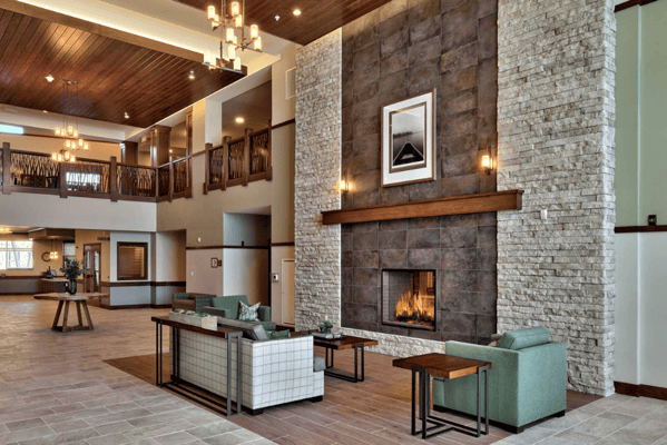 Interior view of a cozy lounge area with a fireplace