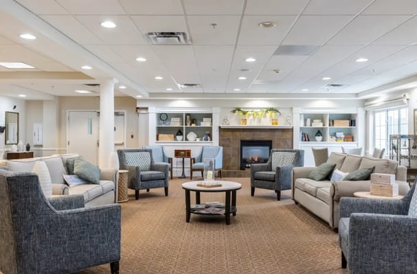 Common area with comfortable seating and a fireplace